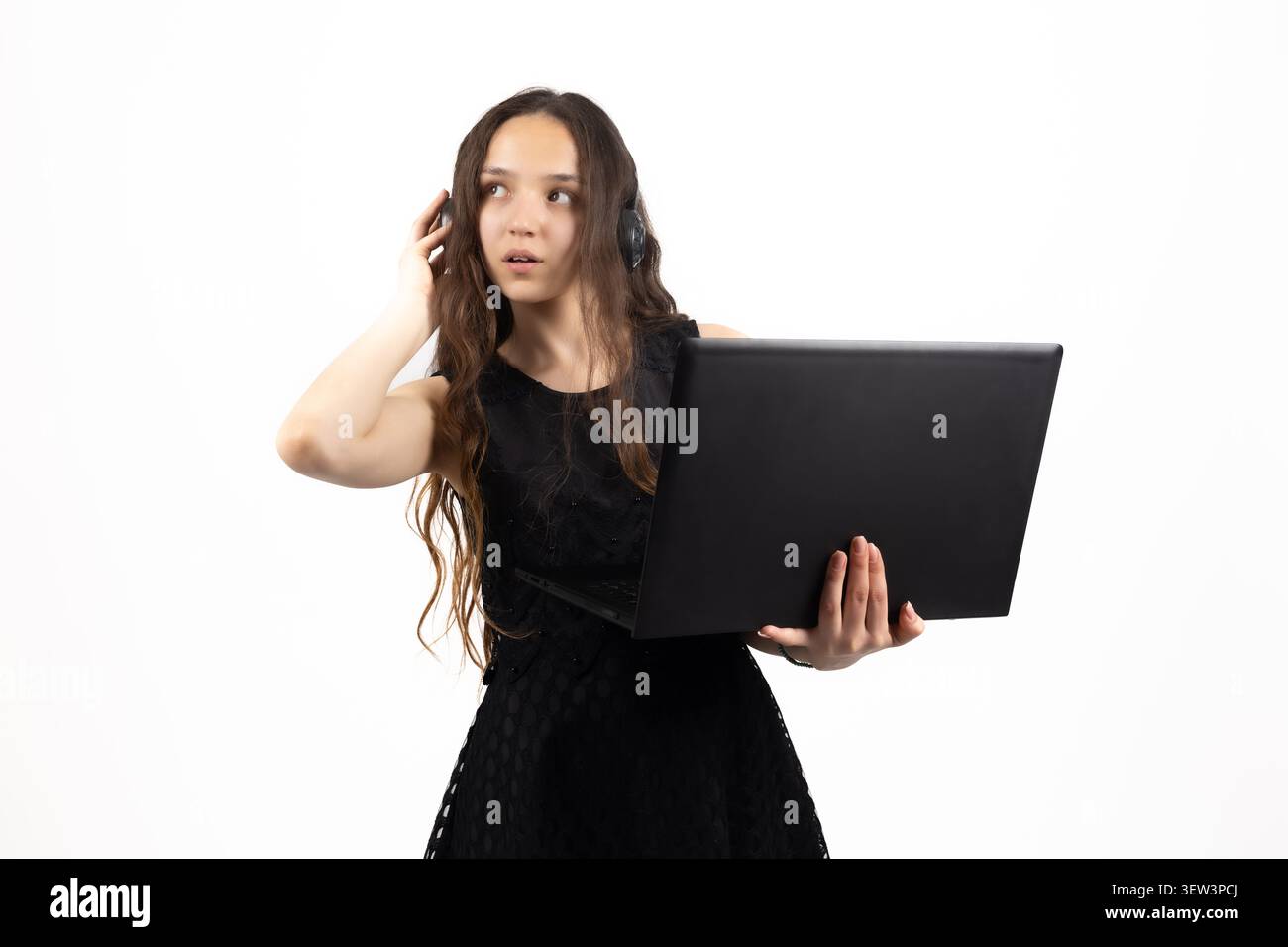 Successful young female student graduate holding certificate in studio Stock Photo