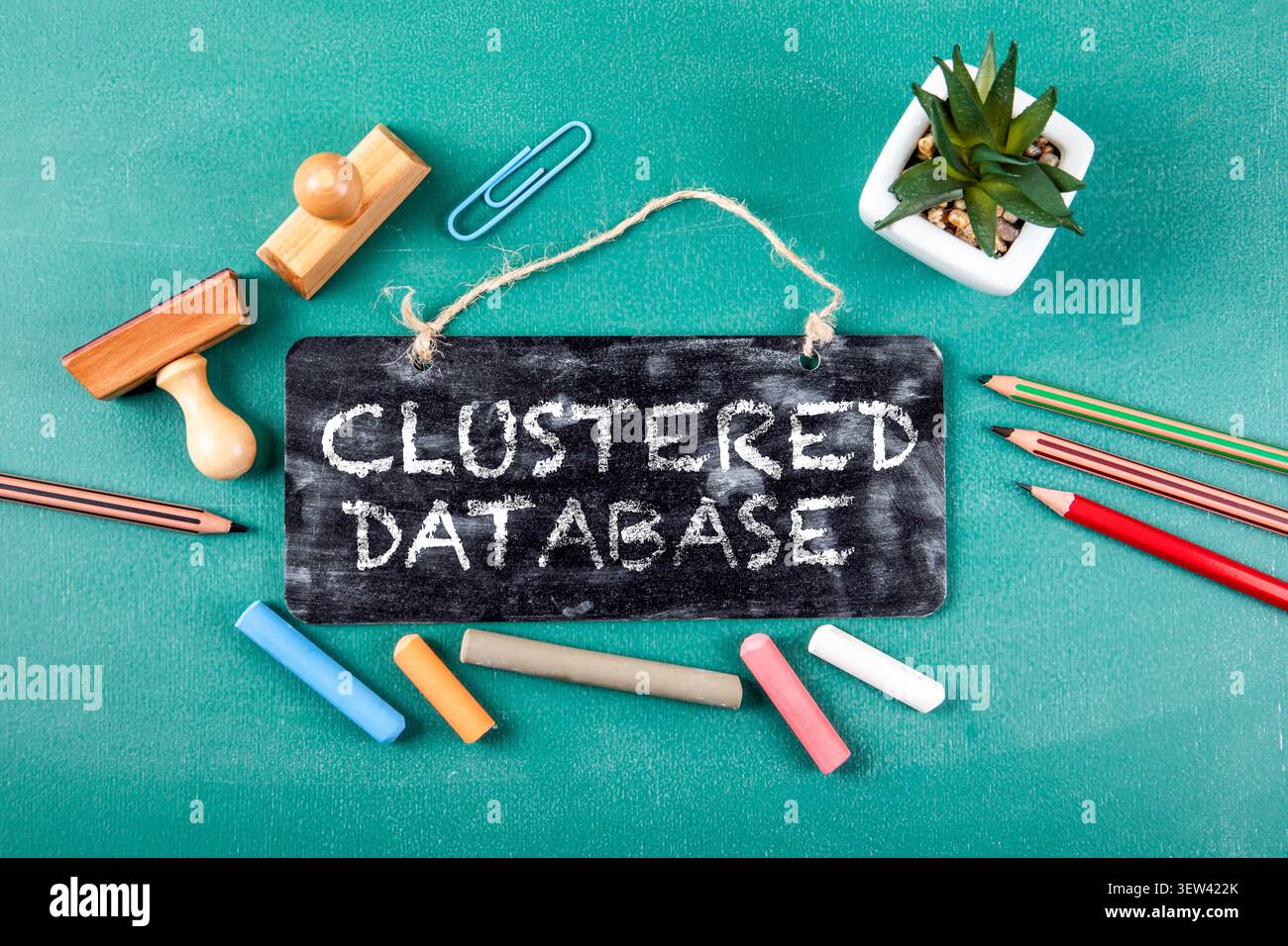 Clustered Database Text on Chalkboard Sign Representing Structured Data Storage System Stock Photo