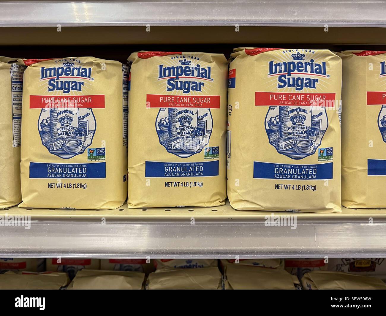 LouAna Imperial Sugar Extra Fine Granulated Pure Cane Sugar bags on the shelves in a supermarket. Texas, USA. Stock Photo