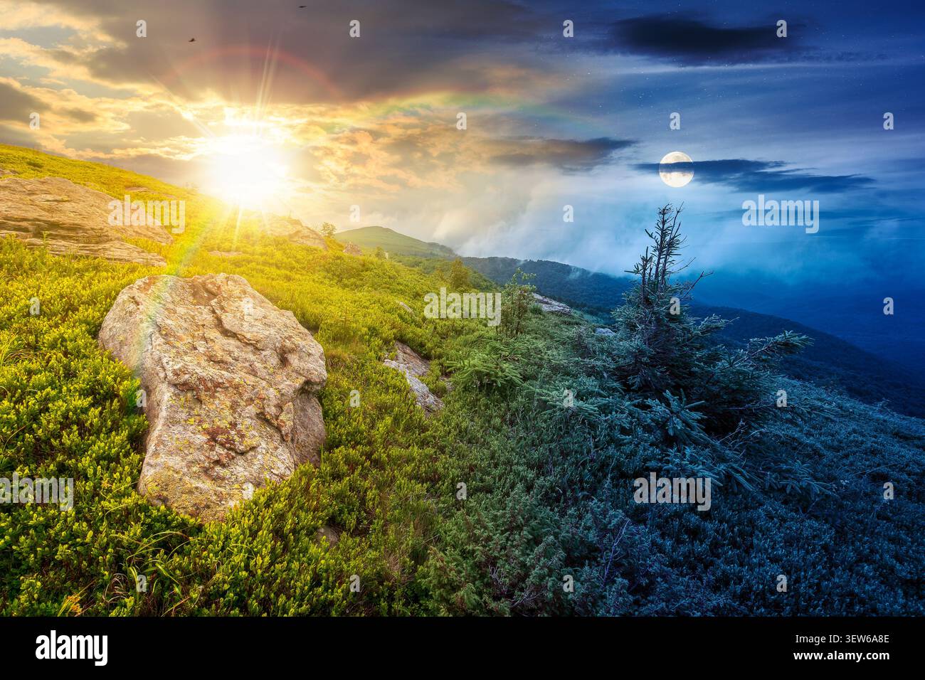 green landscape of mountain on summer solstice. view of rock among grass on the hillside. sun and moon in harmony over travel background and epic sky. Stock Photo