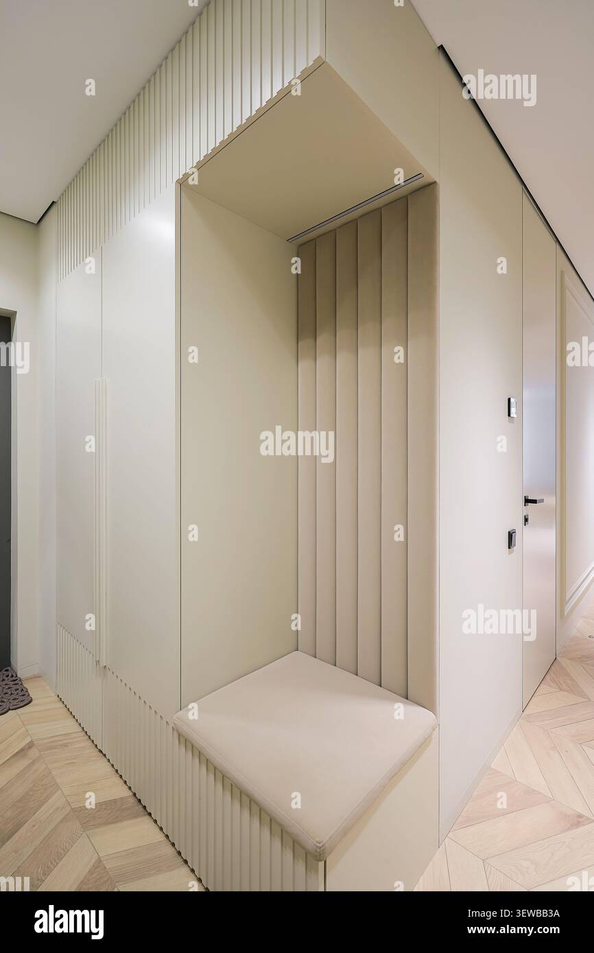 Hallway wardrobe with soft bench seat Stock Photo