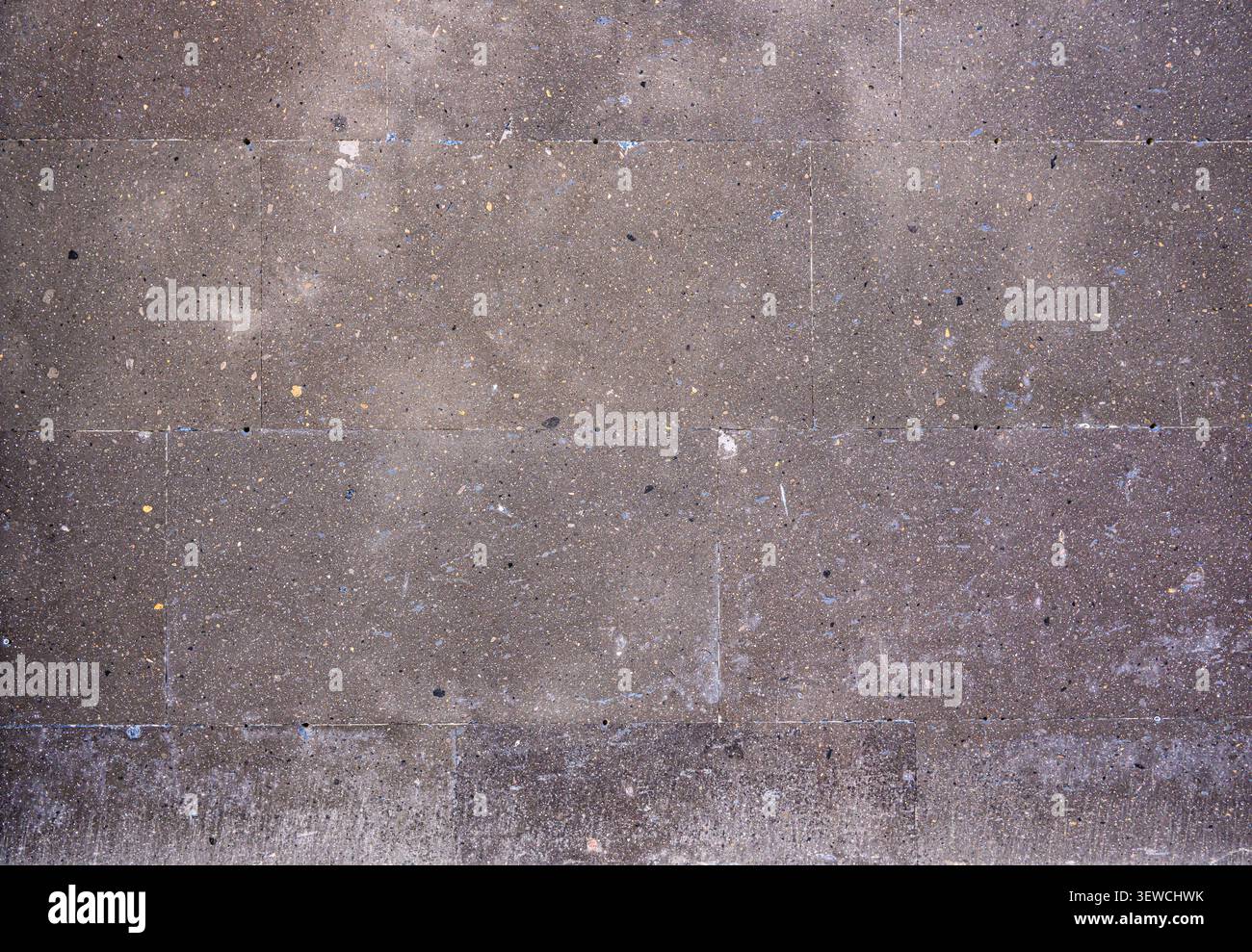 Weathered concrete wall texture with visible grain and subtle cracks Stock Photo