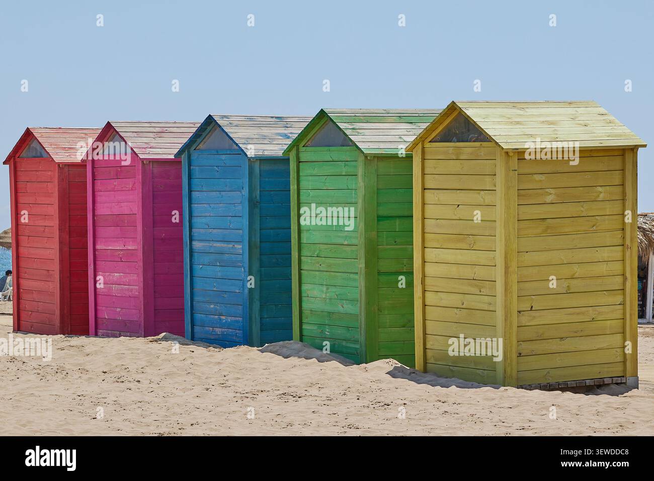 Colorful wooden cabins on Patacona beach in Valencia, Spain. Stock Photo