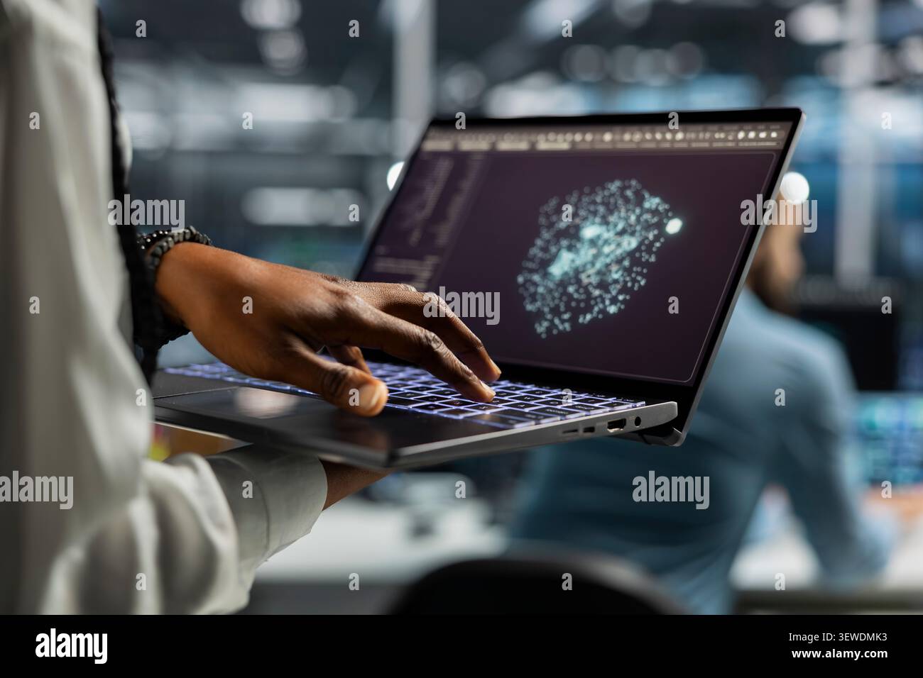 Computer scientist uses an AI language model assistant in a server hub to handle infrastructure maintenance. Stock Photo