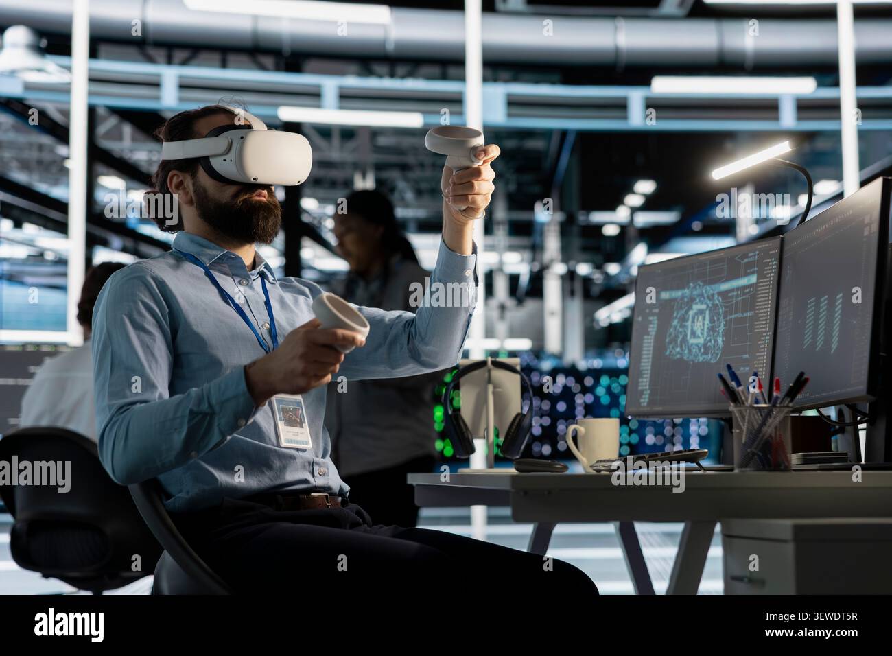 Software developer uses a VR headset to inspect AI neural networks and server systems in a high-tech facility. Stock Photo