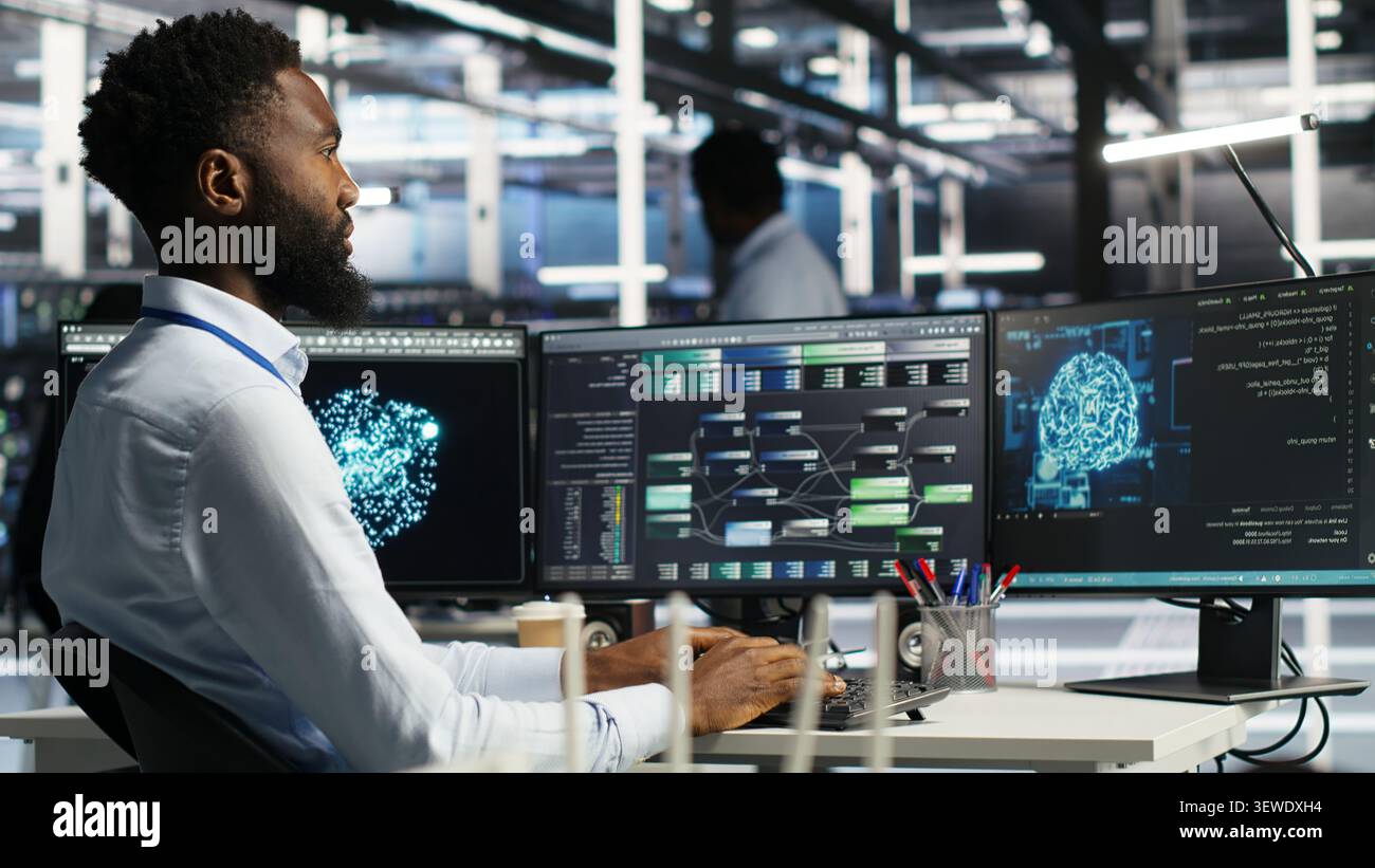 Programmer uses node tree software to identify equipment performance issues and data patterns. Stock Photo