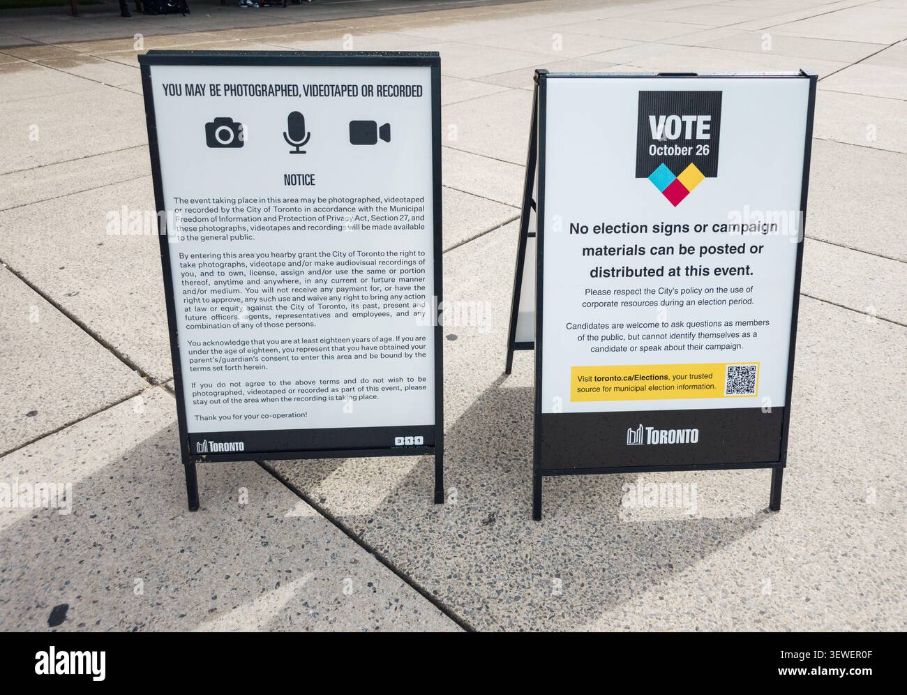 Municipal communication, civic policy, public‑space governance, election‑period rules, privacy notices, city event management, urban signage. - Smartphone Captured Stock Image