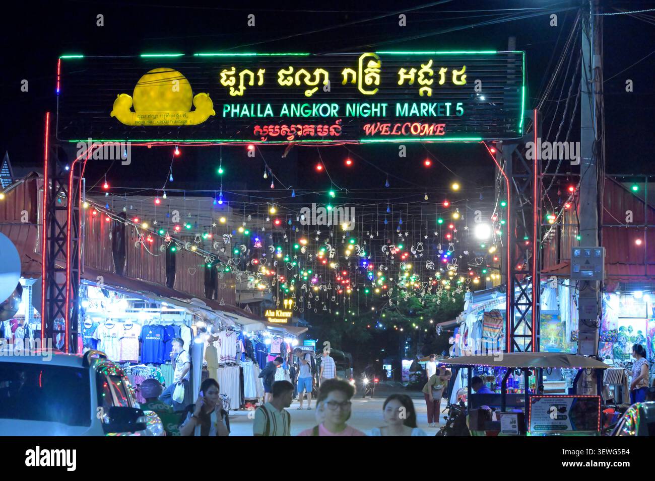 Clothes and souvenirs for sale at one of the night markets in Siem Reap, Cambodia. Stock Photo