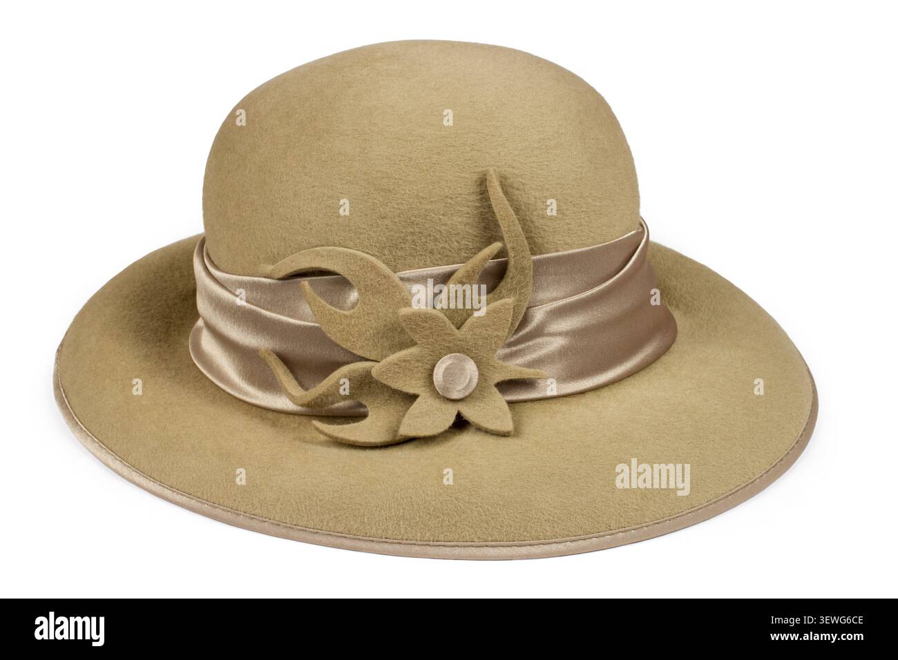 Women's felt hat with a flower on a white background. An old woolen hat with a ribbon. Stock Photo