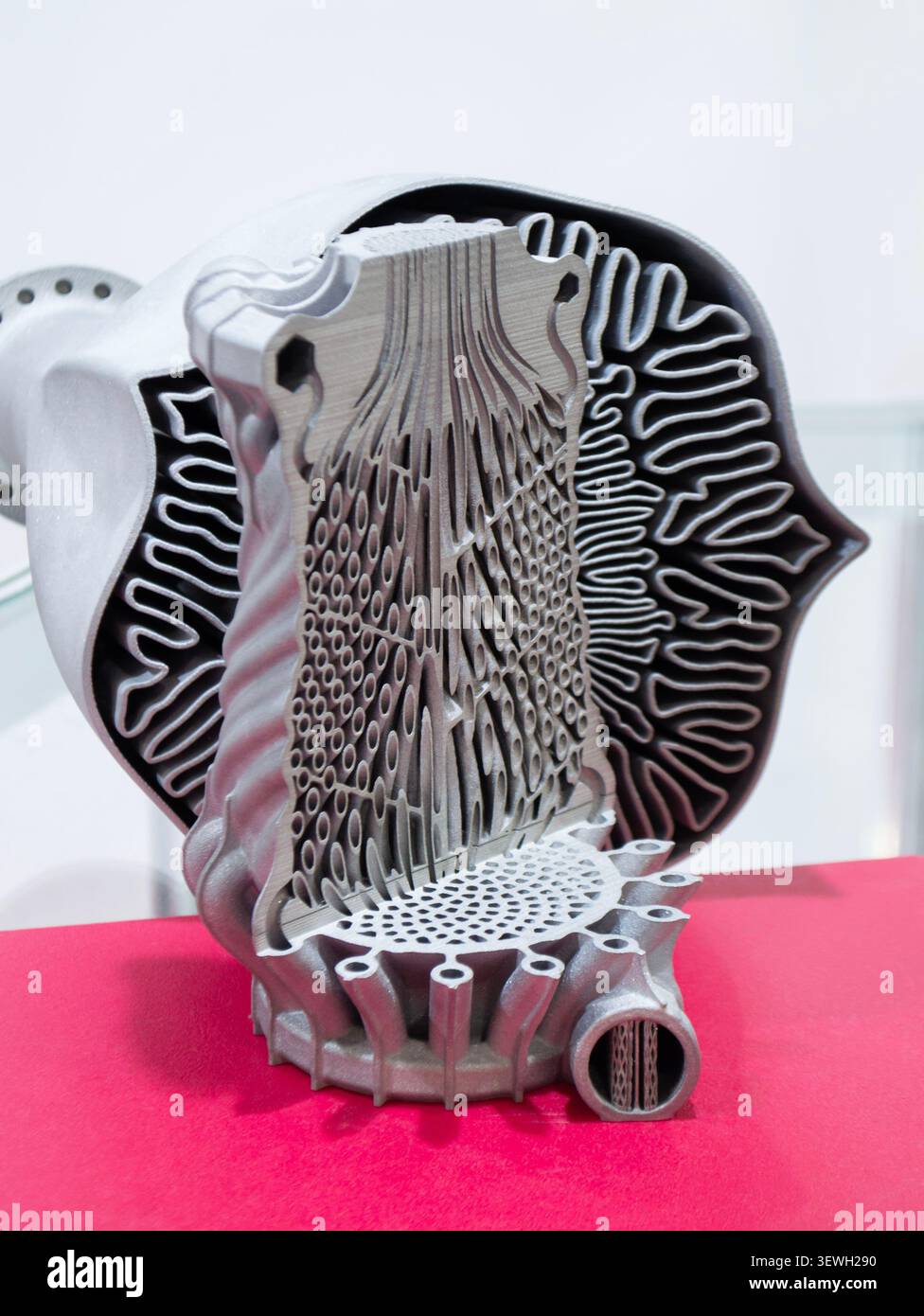 Objects heat exchanger with conformal cooling channels and turbine impeller printed on 3D printer. Models printed on 3D printer from metal powder. Selective Laser Melting. SLM. Additive manufacturing. Stock Photo