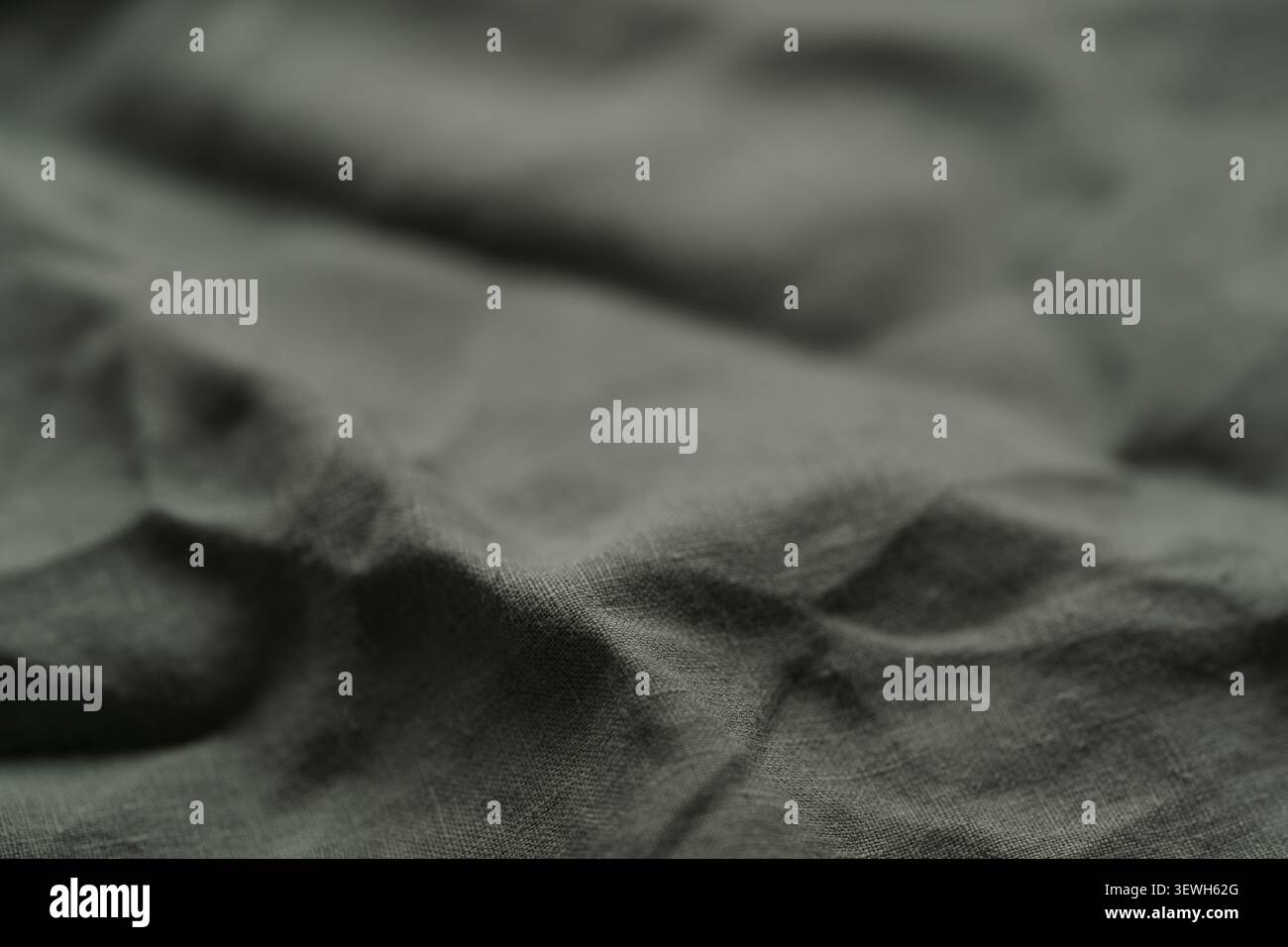 olive green linen fabric closeup Stock Photo