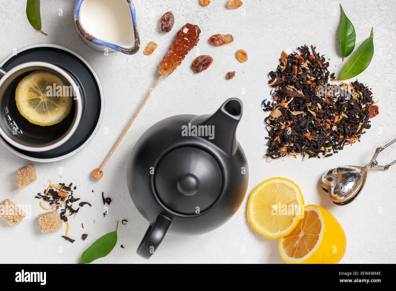 Tea composition on light grey background. Flat lay. Top view. Banner Stock Photo