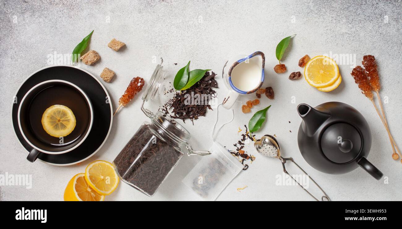 Tea composition on light grey background. Flat lay. Top view. Banner Stock Photo