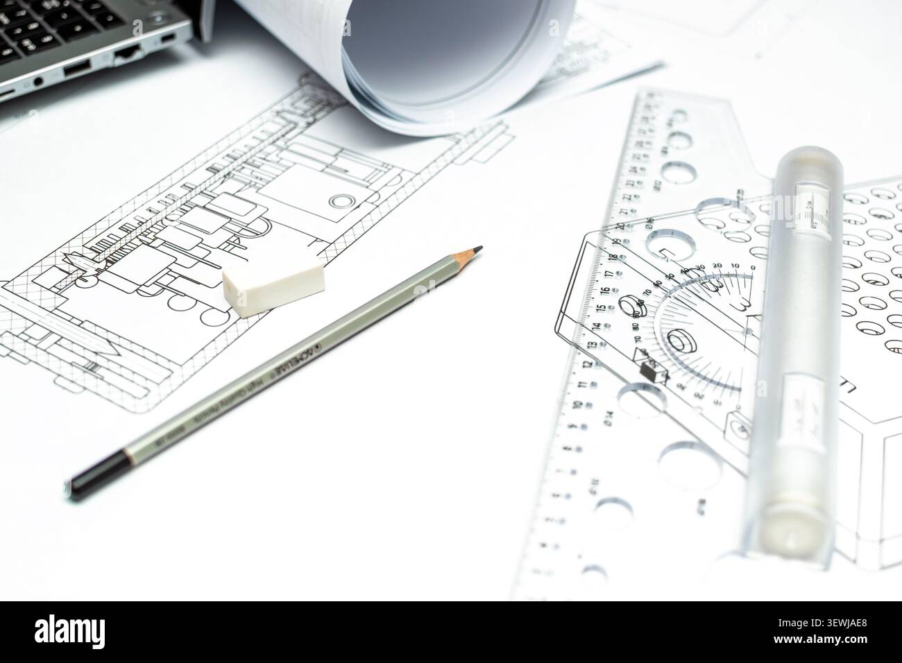 Technical engineering drawing workspace with rulers and pencil Stock Photo