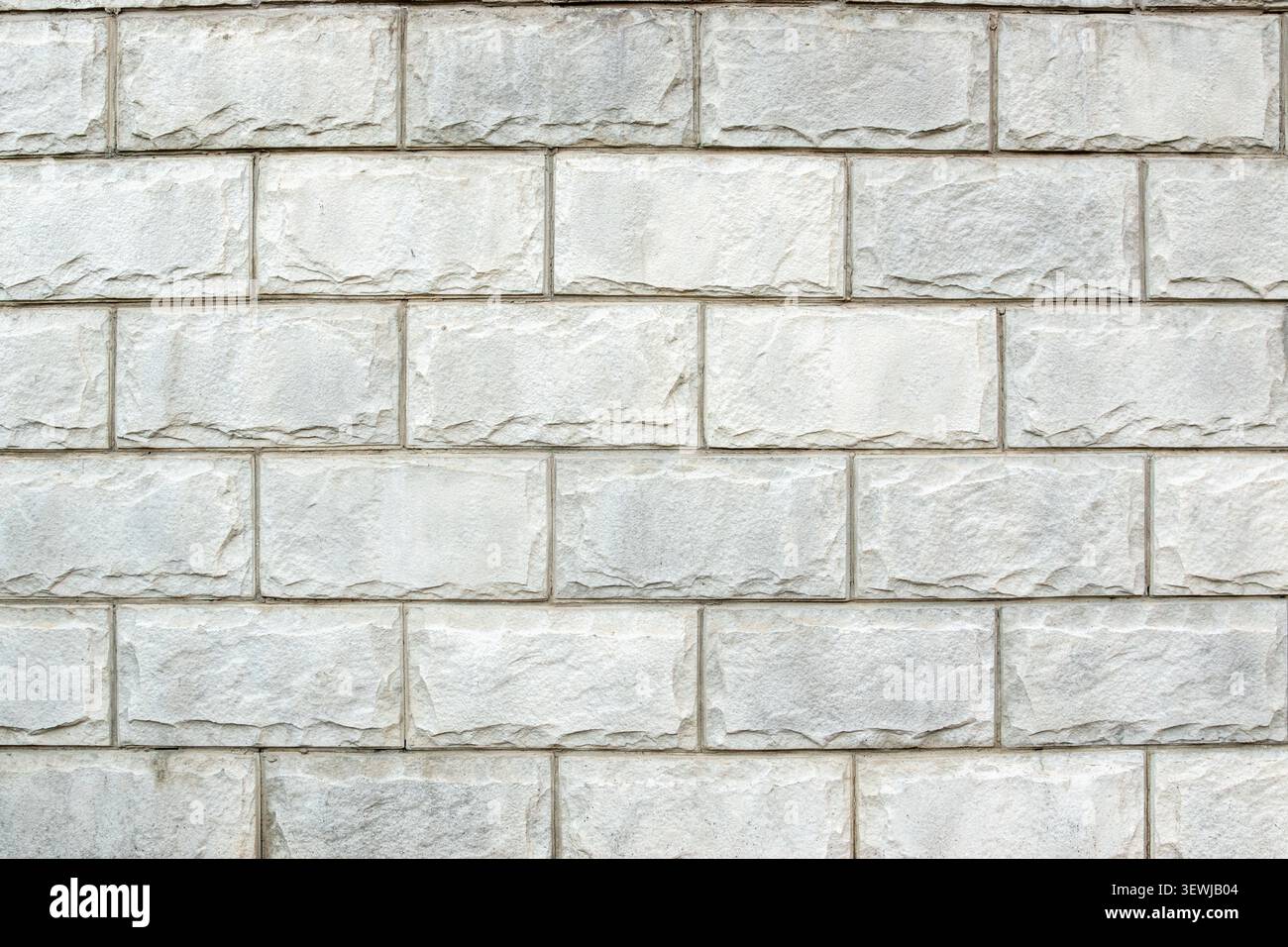 Light grey brick wall texture background horizontal view Stock Photo
