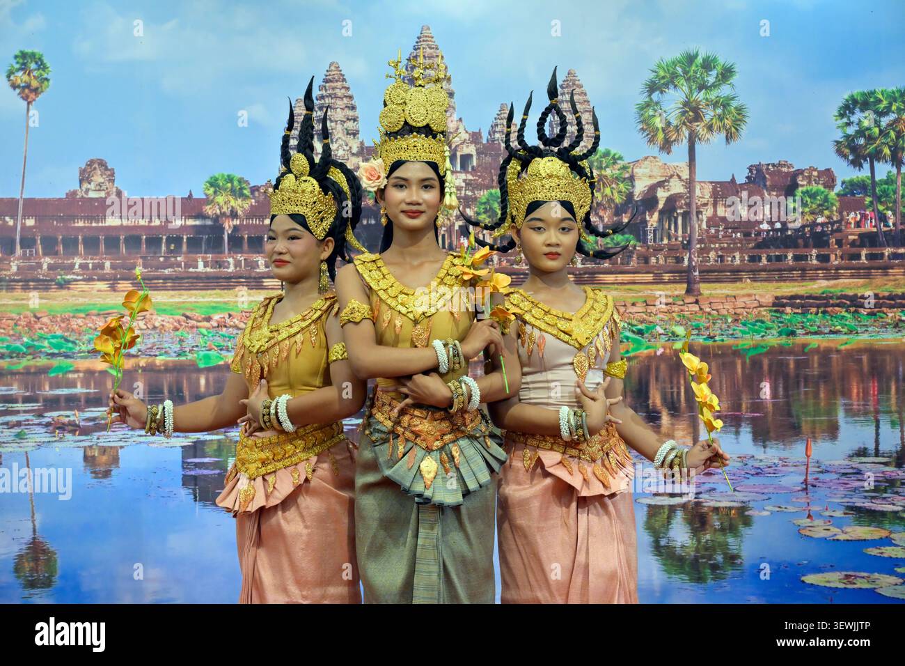 A traditional dance performance by three apsaras in Cambodia. Stock Photo