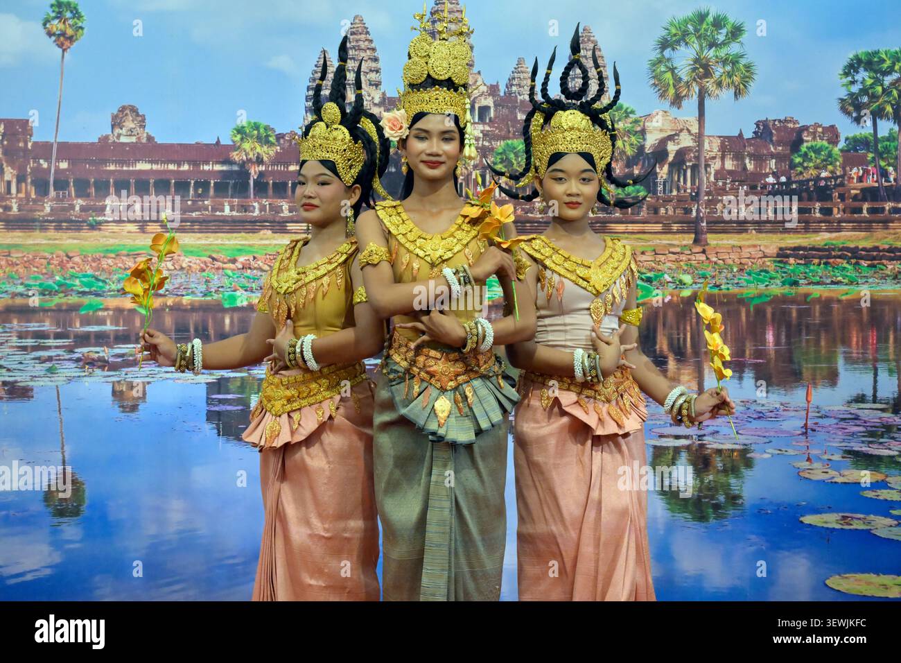 A traditional dance performance by three apsaras in Cambodia. Stock Photo