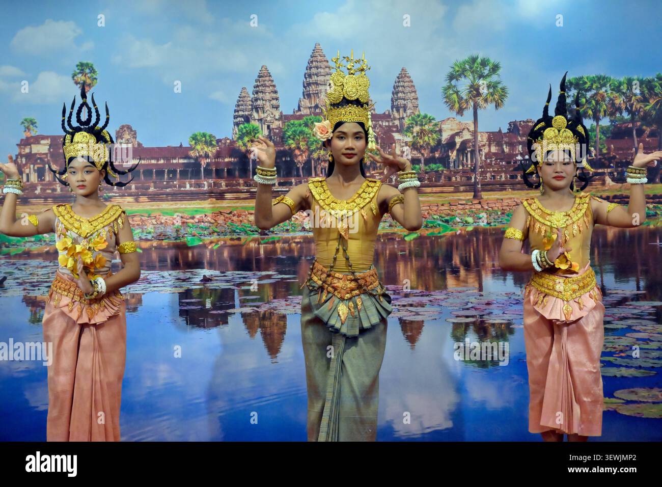 A traditional dance performance by three apsaras in Cambodia. Stock Photo
