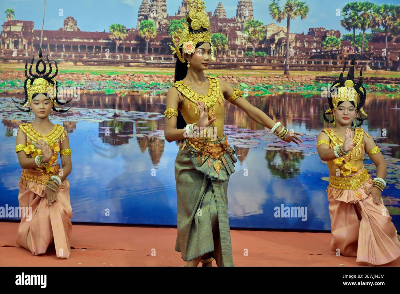 A traditional dance performance by three apsaras in Cambodia. Stock Photo