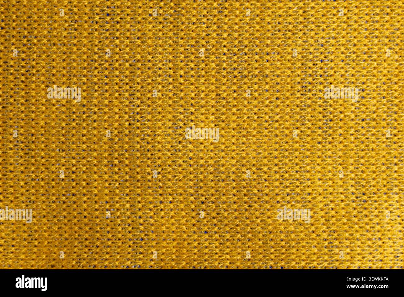 Macro textile surface showing fuzzy fibers and precise knitted loop structure Stock Photo