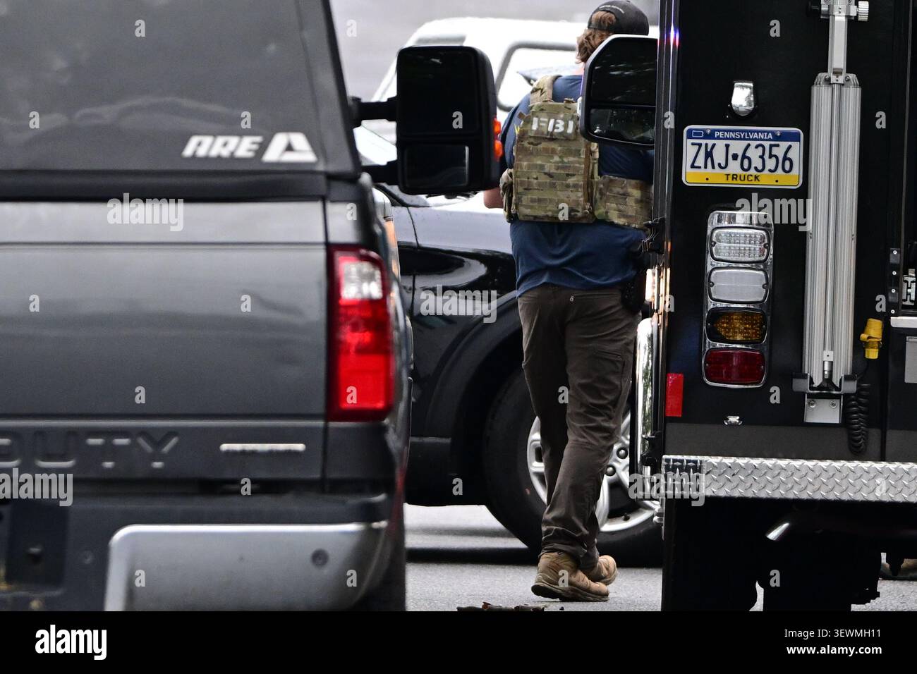 A Federal Bureau of Narcotics agent with the drug just seized, USA