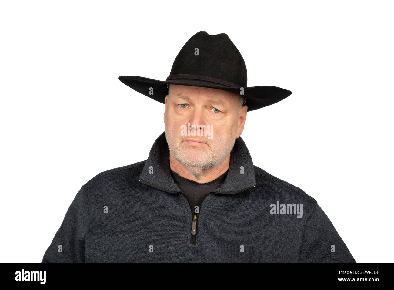 Man in Dark Western Outfit Looking at Camera Isolated on White Background Stock Photo