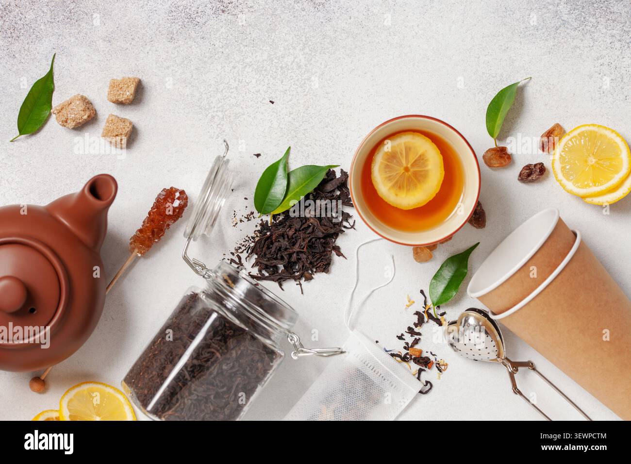 Tea composition on light grey background. Flat lay. Top view. Banner Stock Photo