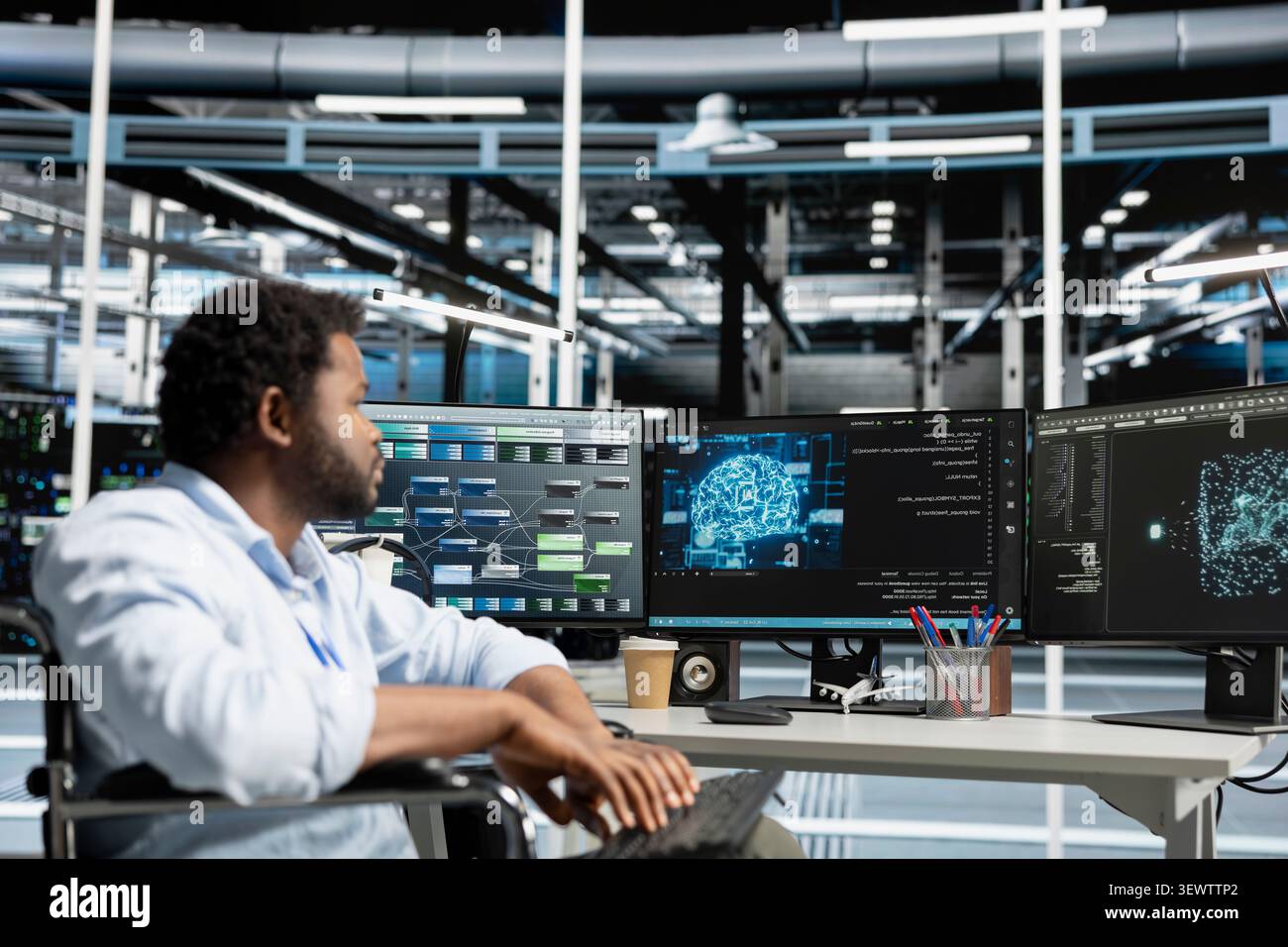 Engineer with paraplegia uses AI visualization tools in an inclusive data center to find bugs and detect system errors. Stock Photo