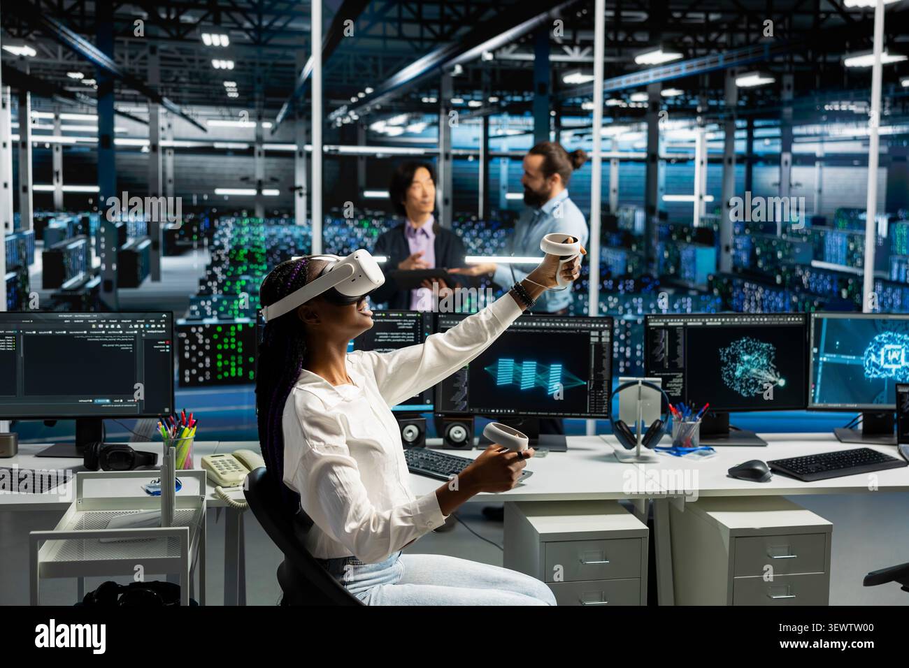 Administrator wears a headset in a server hub, using artificial intelligence troubleshooting to assist users. Stock Photo