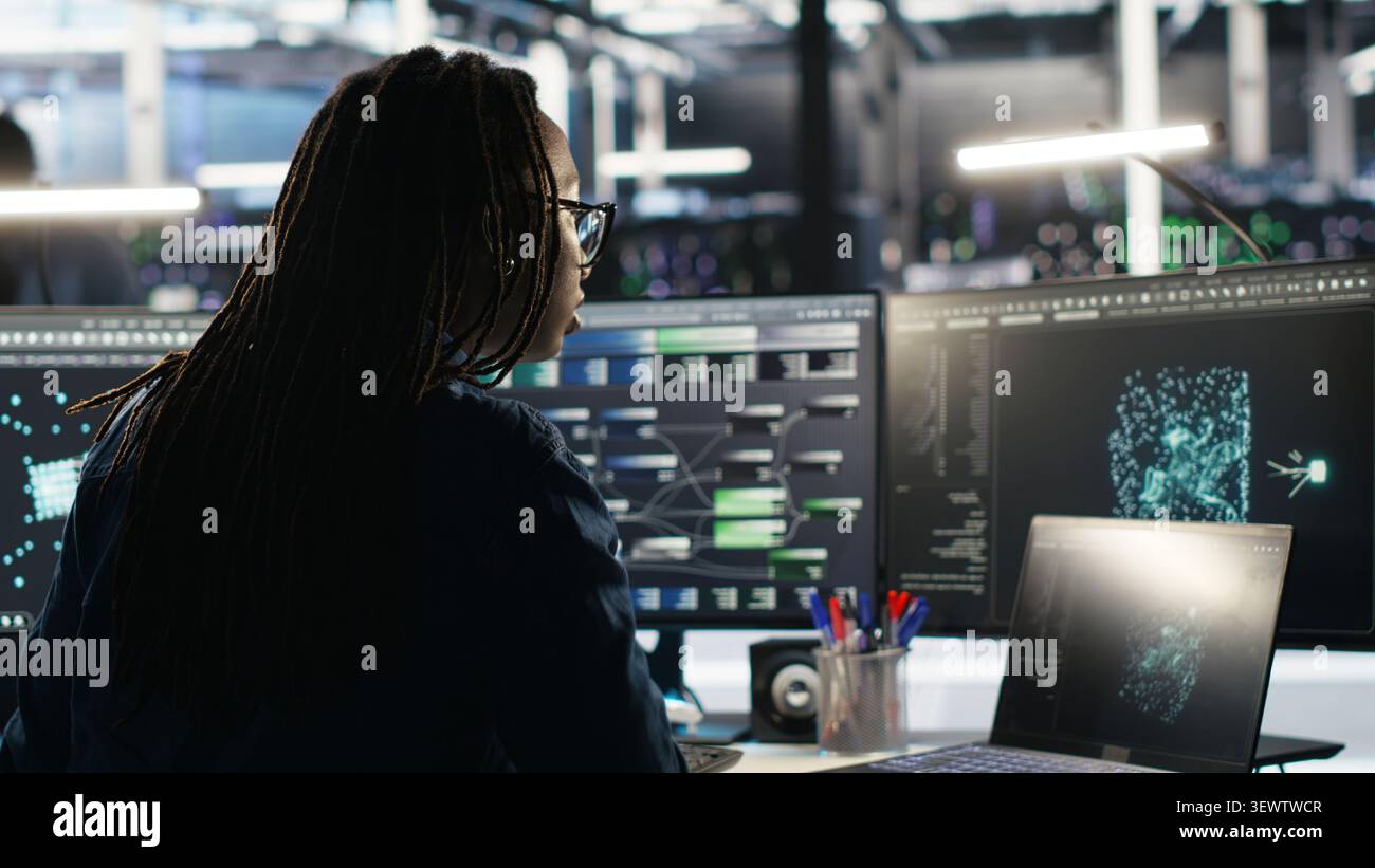 Software developer uses node tree software to identify equipment performance issues and data patterns. Stock Photo