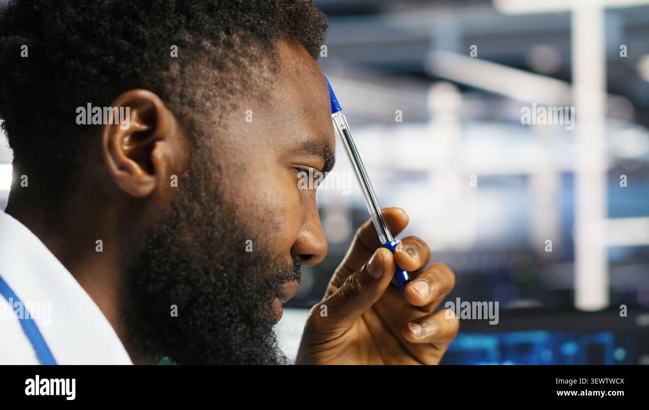 Computer scientist uses node tree software to identify equipment performance issues and data patterns. Stock Photo
