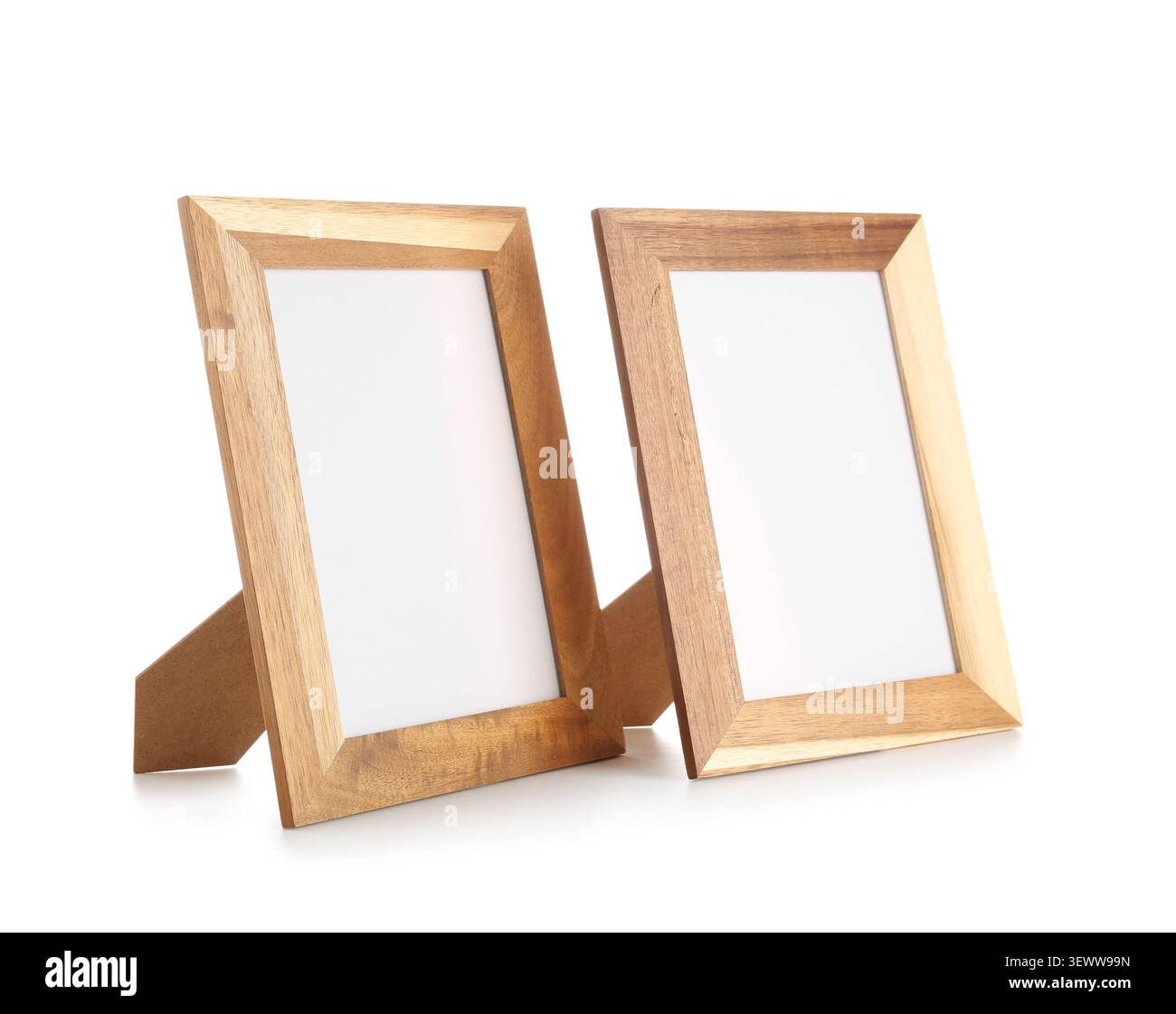 Two empty wooden photo frames on white background Stock Photo