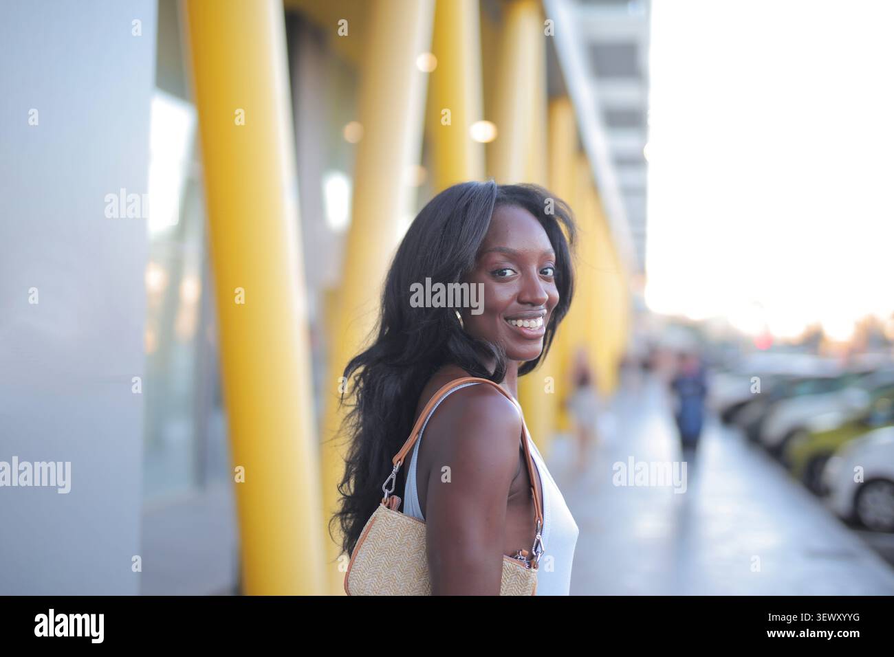 Woman dark hair smiling hi-res stock photography and images - Alamy