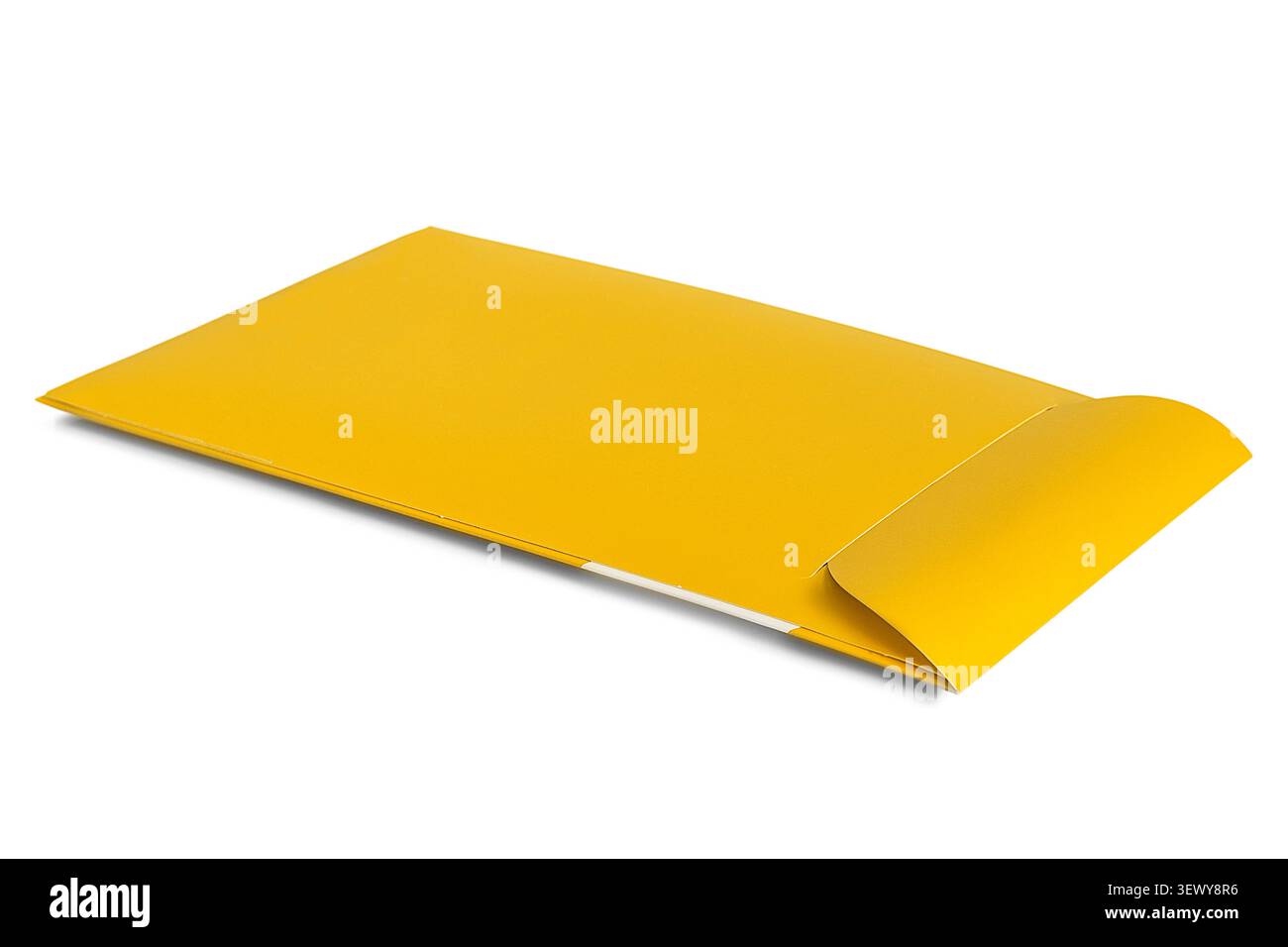 Blank yellow closed packet lying on white background Stock Photo