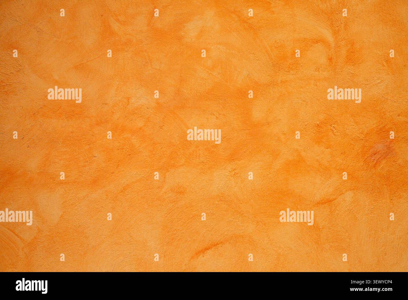 Soft burnt orange surface featuring gentle shading and grain Stock Photo