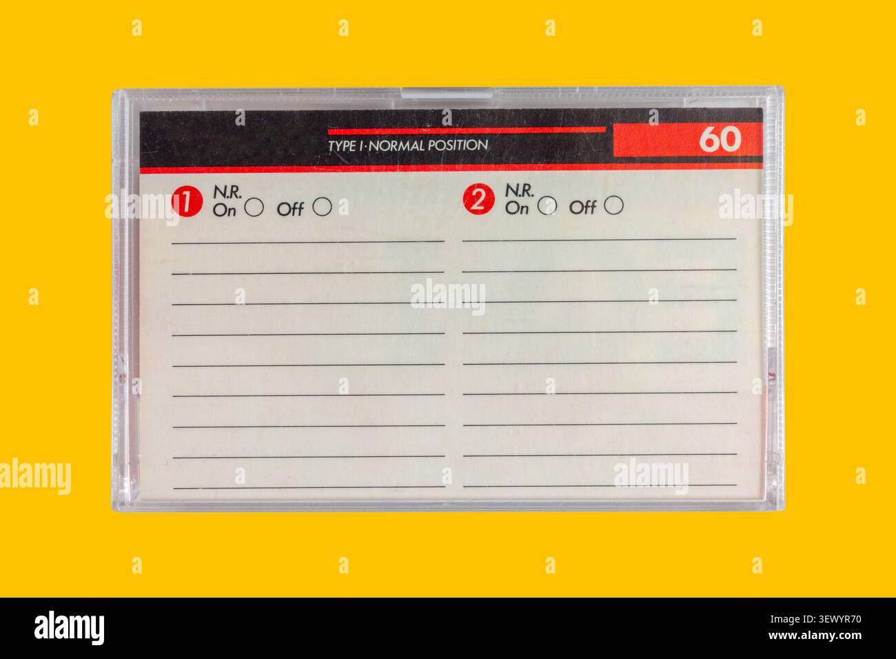 Vintage box for a compact cassette with copy space on a yellow background Stock Photo