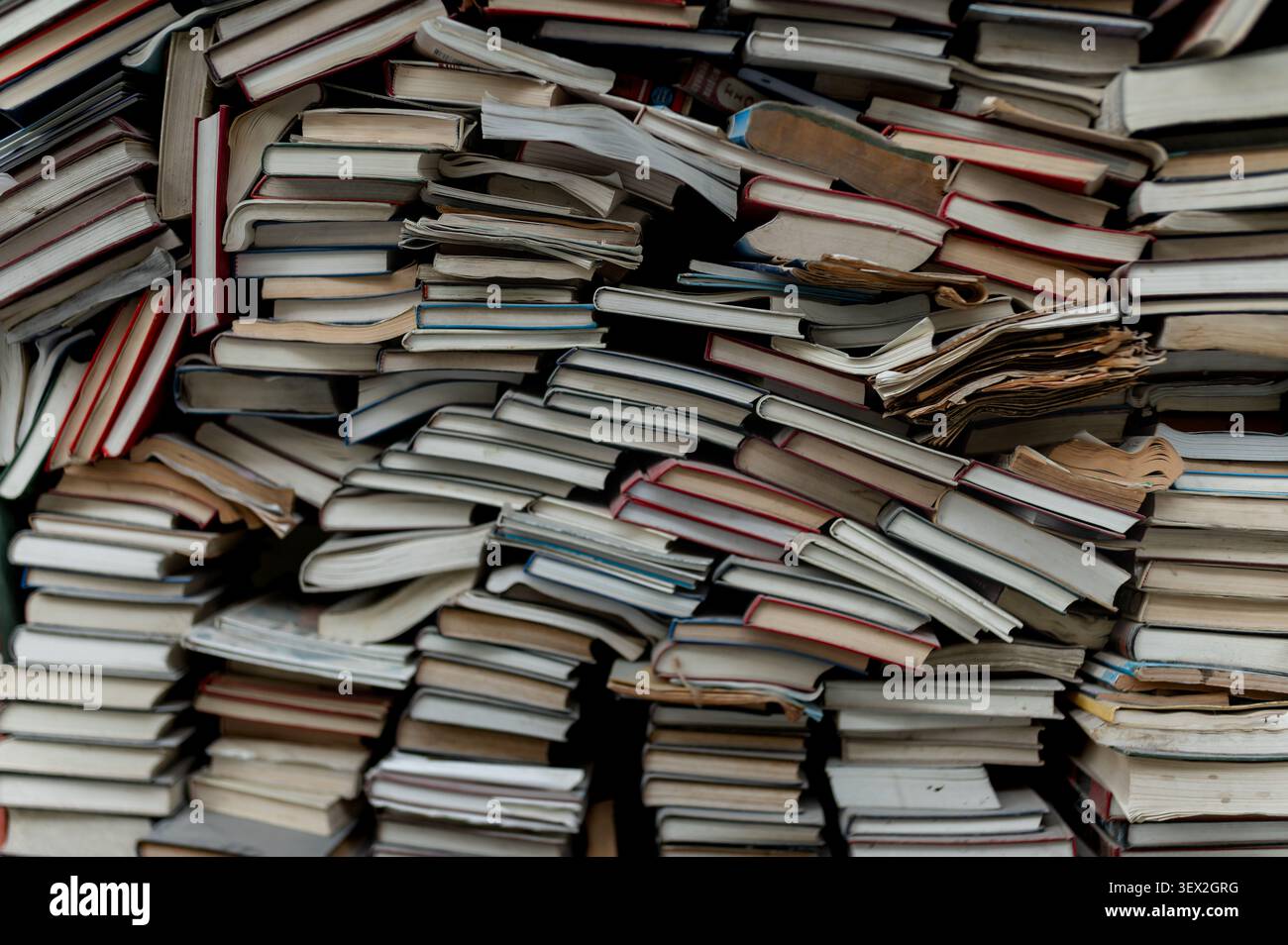 Stack of Old Books Background with Vintage Paper Texture Stock Photo