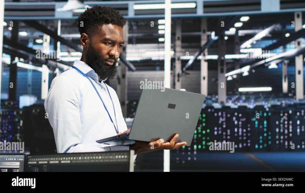 Programmer uses node tree software to identify equipment performance issues and data patterns. Stock Photo