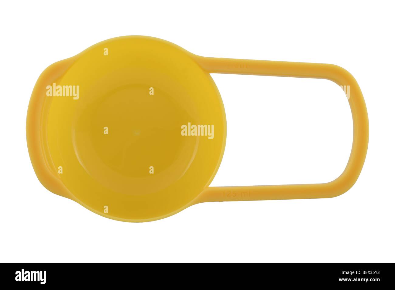125 ml measuring cup in yellow Stock Photo