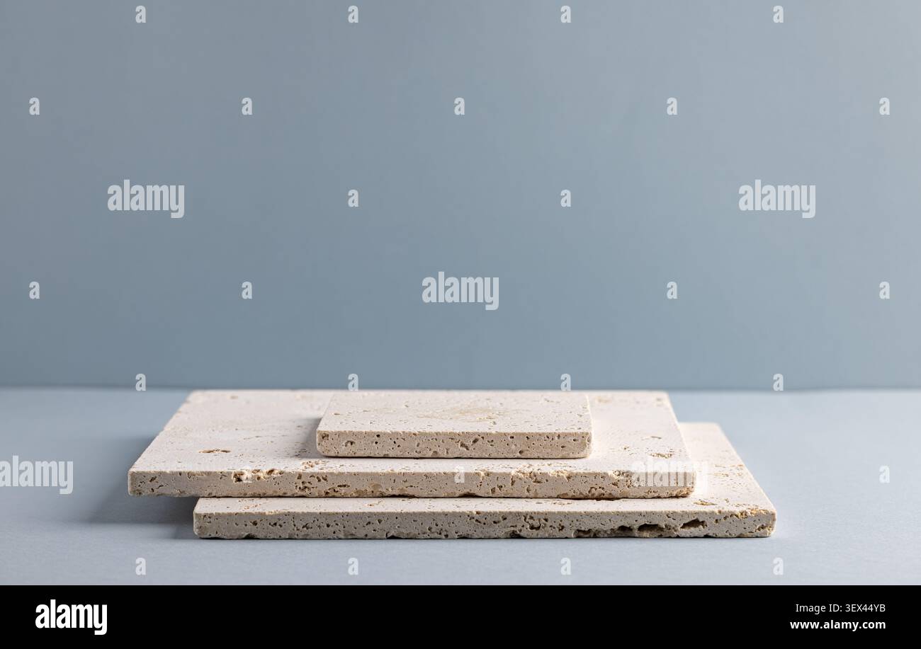 Minimalist Stone Tile Array on Grey Background for Modern Interior Design Stock Photo