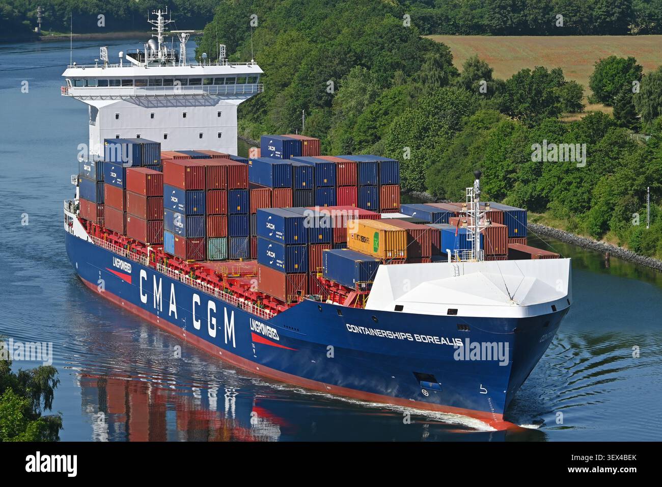 CONTAINERSHIPS BOREALIS passing the KIel canal showing its new CMA-CGM livery Stock Photo