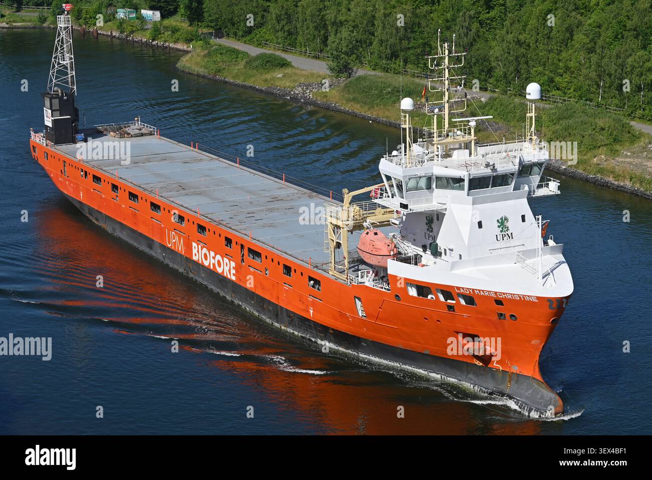 General cargo ship LADY MARIE-CHRISTINE passing the Kiel canal Stock Photo