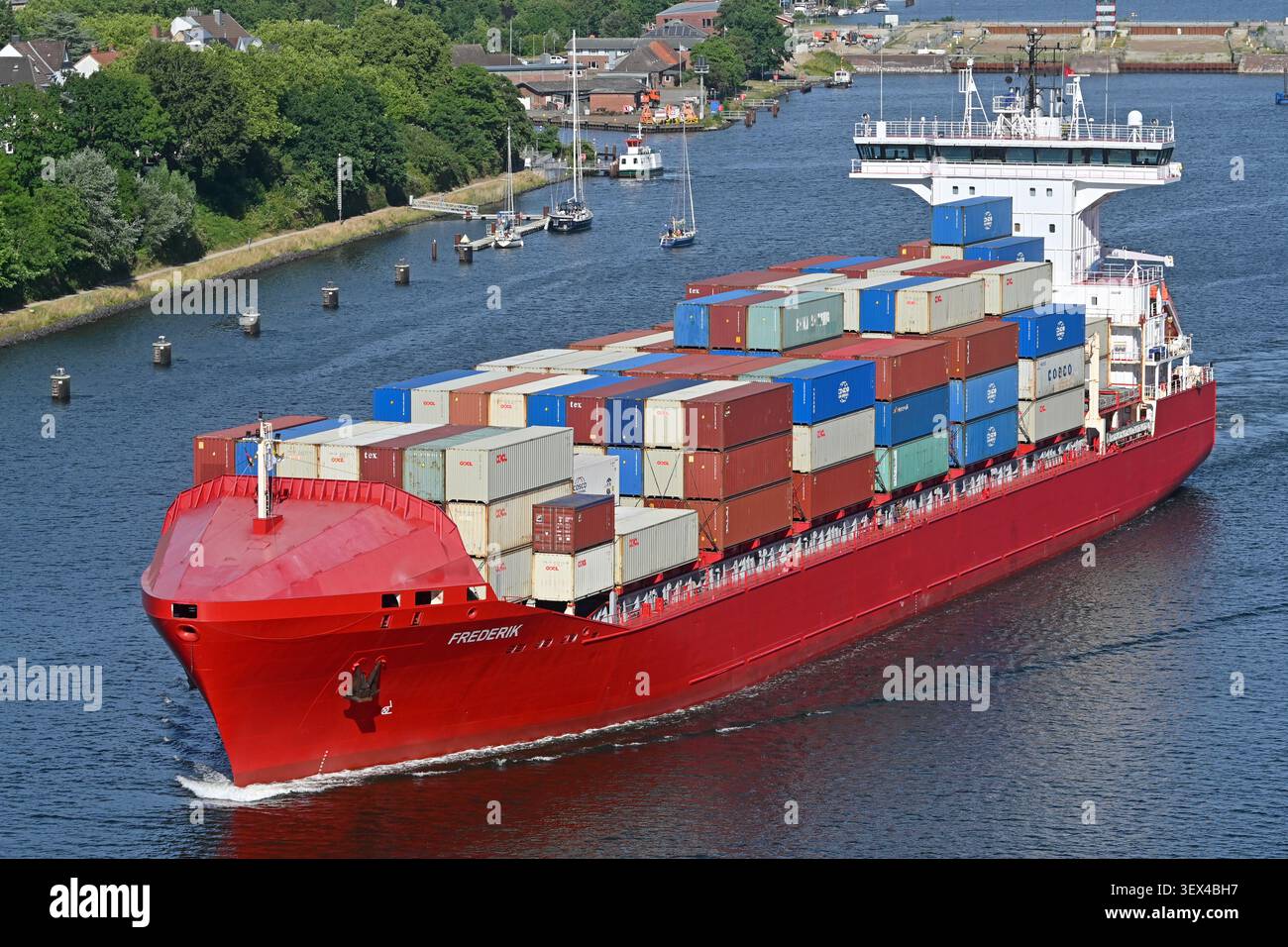Containership FREDERIK passing the Kiel canal Stock Photo
