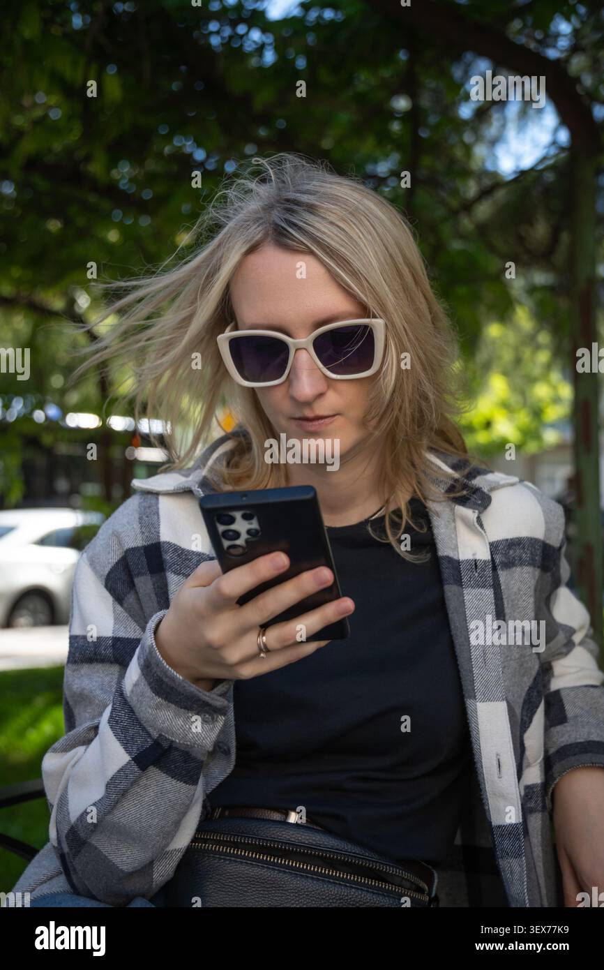 Person wearing plaid shirt hi-res stock photography and images - Alamy