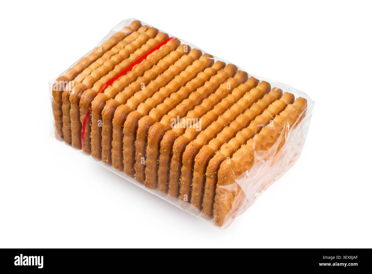 Transparent packaging of biscuits. A pack of cookies on a white background. Biscuits in cellophane packaging. Stock Photo