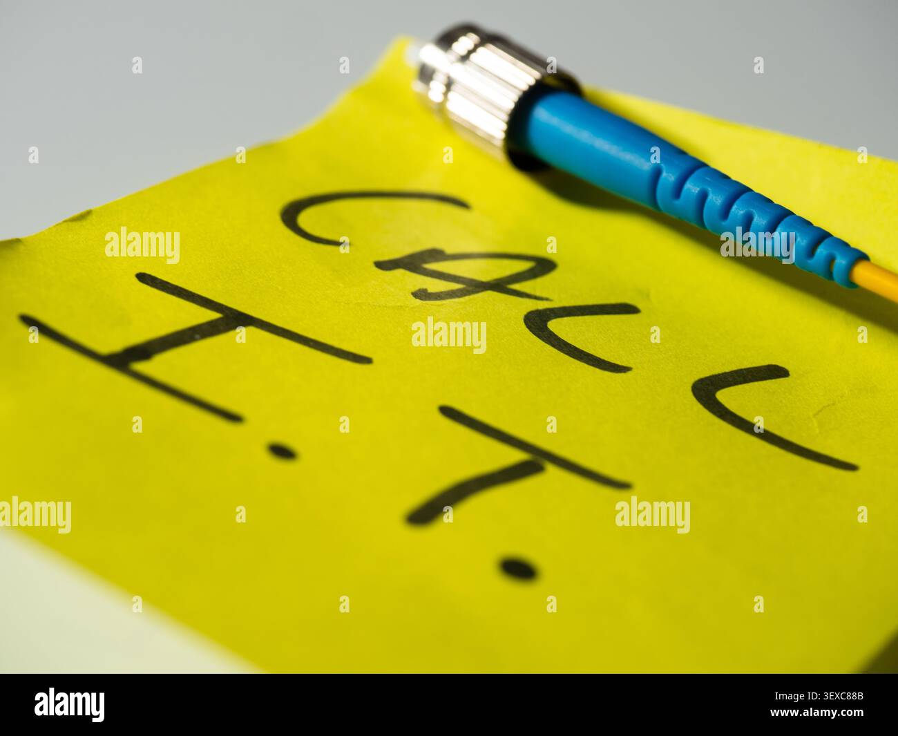 Reminder note to call network technician  Stock Photo