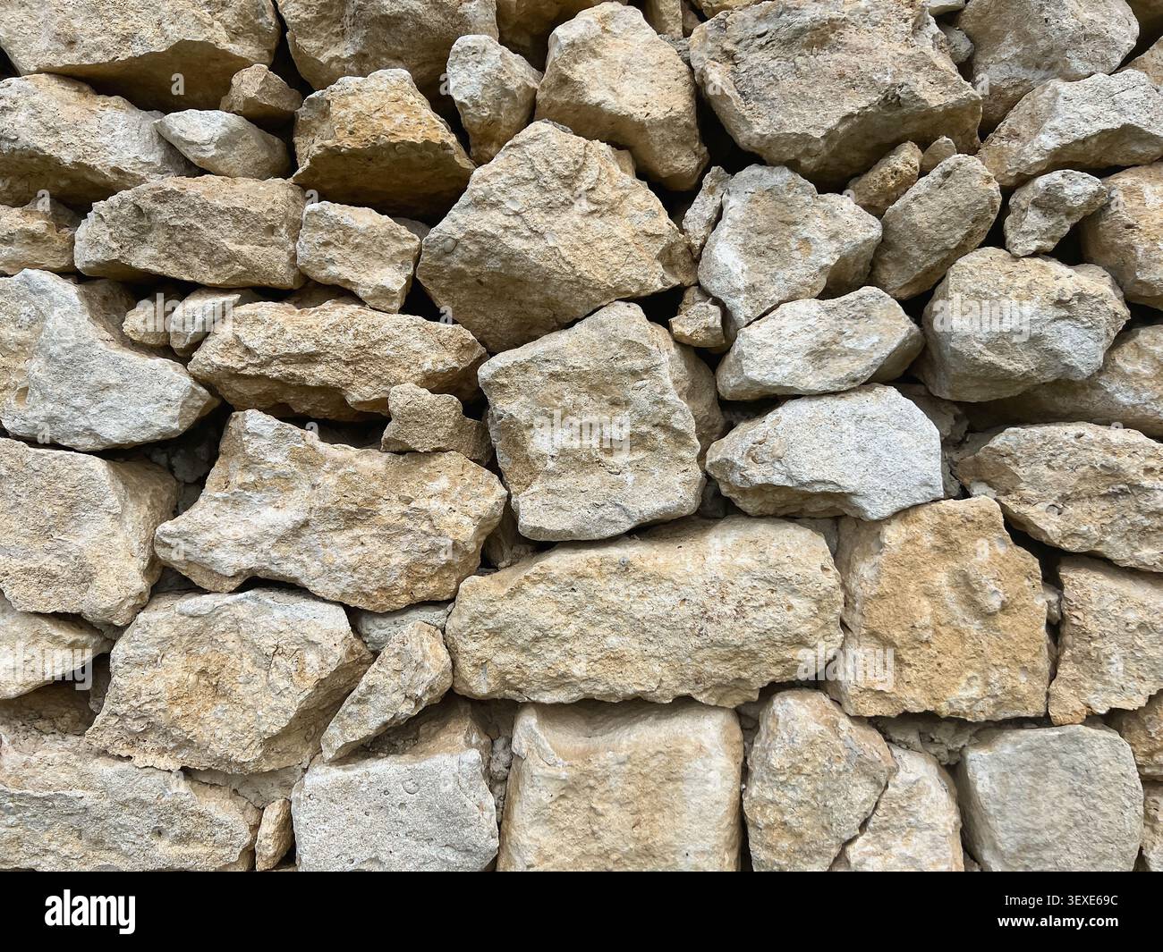 Beige Natural Stone Wall Close Up Texture Stock Photo