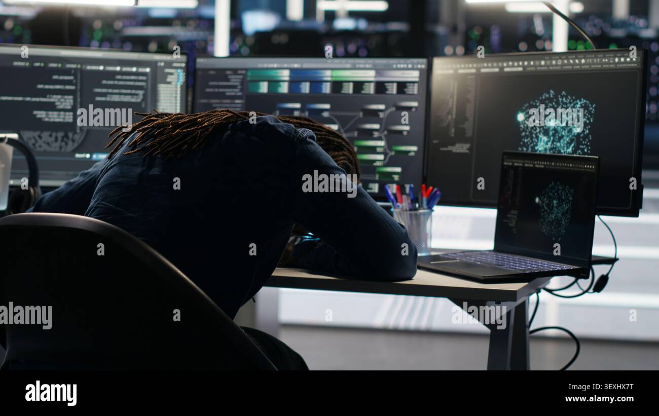 Frustrated data center worker reacts to malfunctioning node tree software and technical errors during AI analysis. Stock Photo