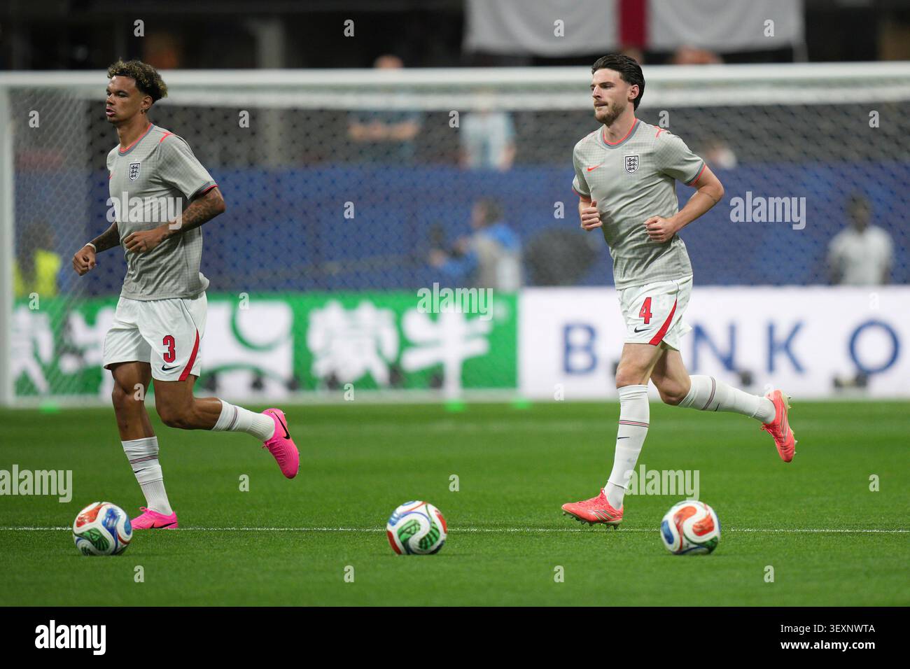 England's Declan Rice (4) and England's Nico O'Reilly (3) warm up ...