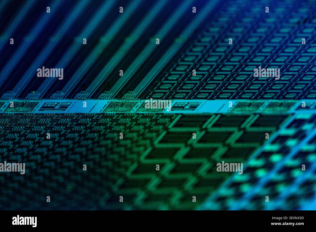 Wafer surface showing electronic circuit patterns on a semiconductor substrate Stock Photo